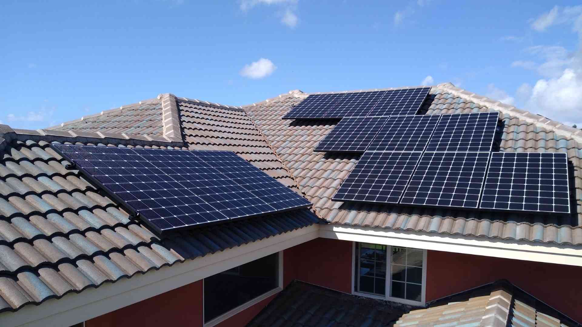 rising sun solar panels on a tile roof in Hawaii