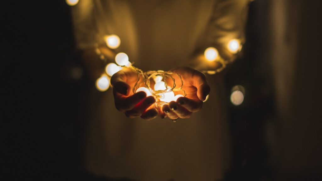 hand holding mini light