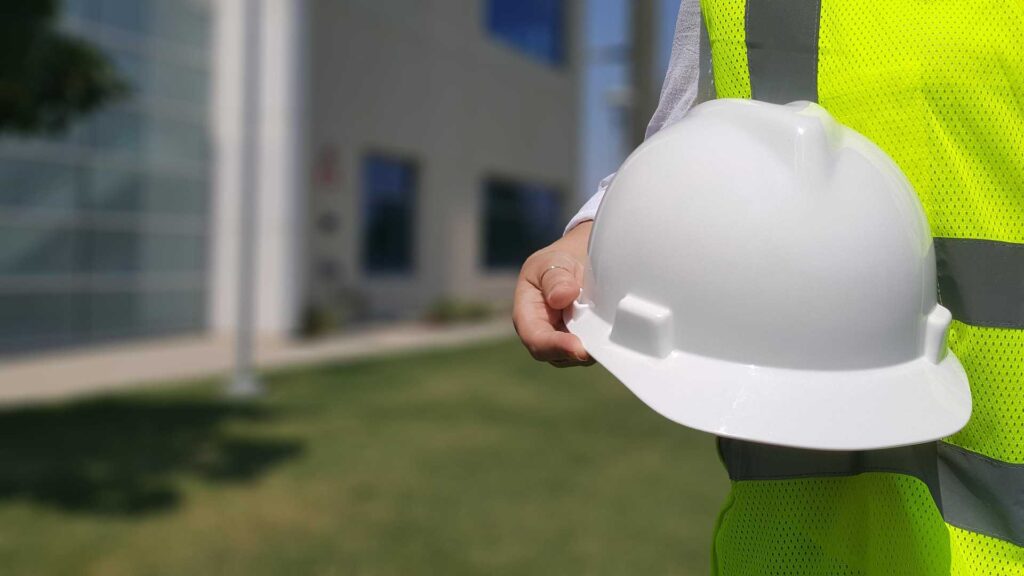 skilled oahu solar installer holding white hard hat